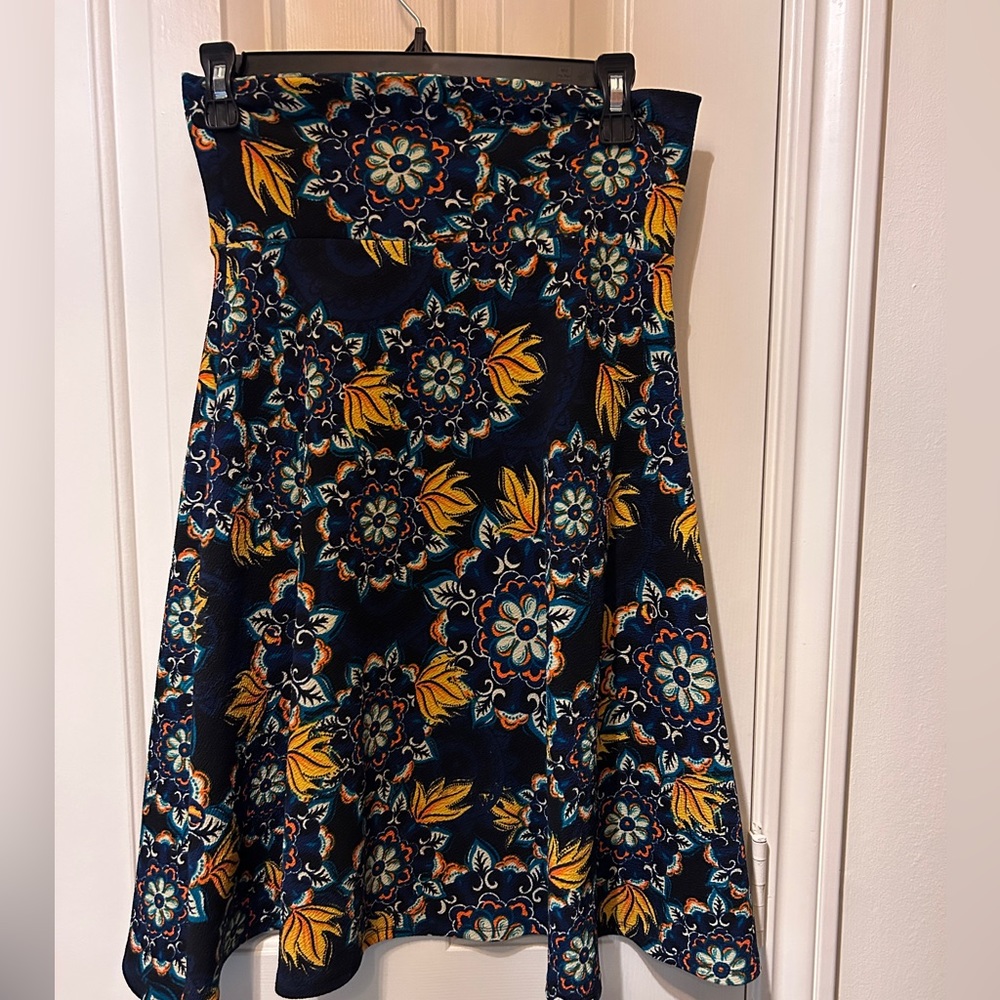 LulaRoe skirt. Thicker material and great to wear with boots in the winter